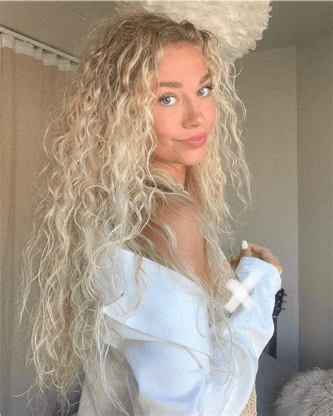 She made her porn debut back in 2001. . Curly hair blonde porn
